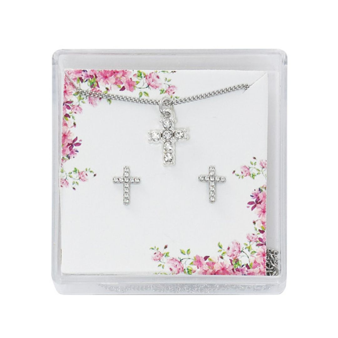a cross necklace and earrings