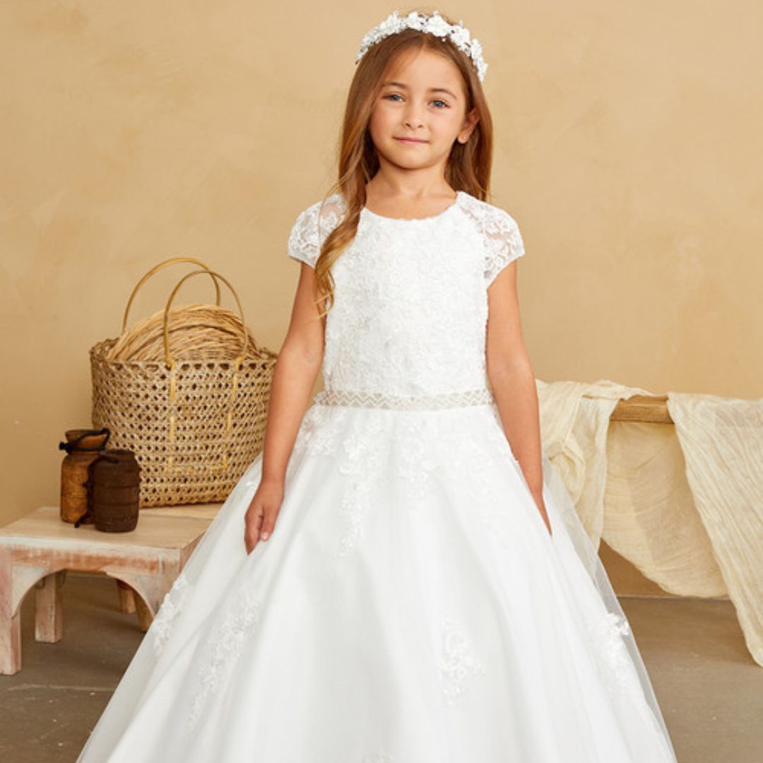 Girl in a lacy communion dress